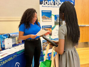 A Domtar recruiter at an HBCU career fair speaks with a potential candidate.