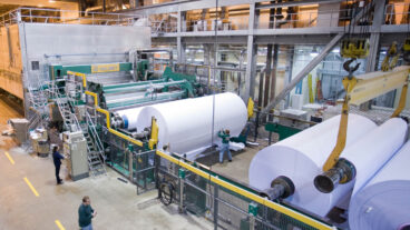 Overhead view of Domtar's J5 paper machine in Johnsonburg, Penn. Domtar's quality commitment extends from our mills to our customers. Read more on Newsroom[dot]Domtar[dot]com.