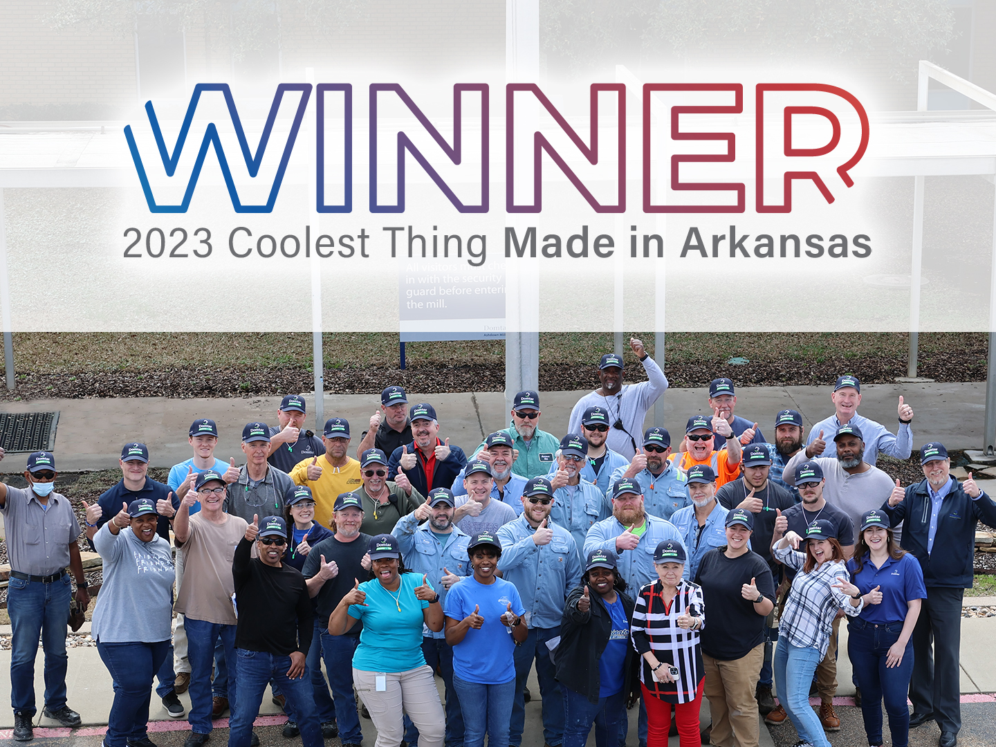 Our fluff pulp was named as the coolest thing made in Arkansas. Image: Group of Ashdown Mill employees below banner that says WINNER 2023 Coolest Thing Made in Arkansas.