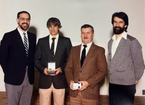 Philippe Messier, second from left, receiving a watch in 1985 for his 25th anniversary of working for Domtar. From left: Pierre Trudel, Messier, Denis Allard, René M. Tremblay. Read more about how this long-time Windsor Mill employee contributed to our history.